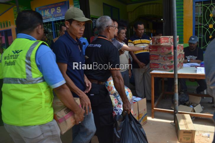ACT Riau Salurkan Bantuan Dari Singapore Untuk Korban Kebakaran di Dumai