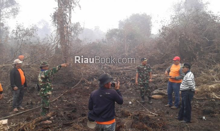 Kok bisa, Kampar Dilanda Hujan Lebat Tapi Masih Berasap
