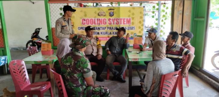 Ngopi Bareng Tokoh Masyarakat, Personel Bhabinkamtibmas Kuala Kampar Sampaikan Pesan Kamtibmas