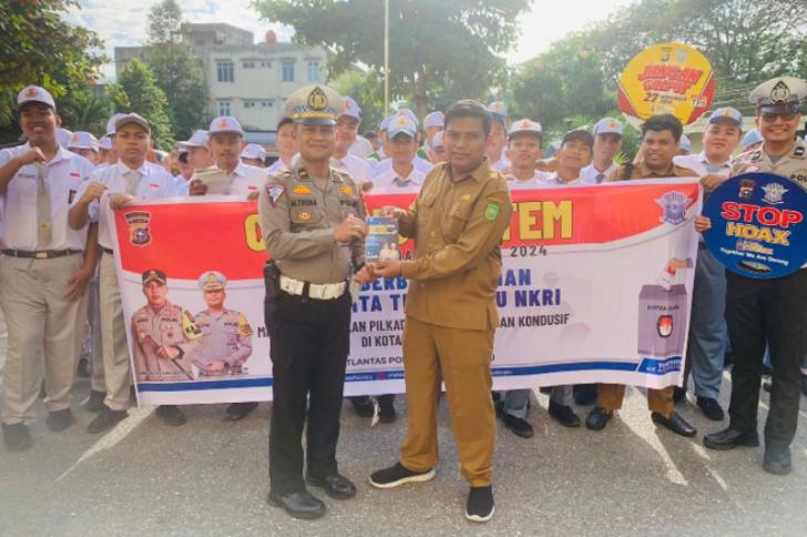 Satlantas Polresta Pekanbaru Sosialisasi kepada Pelajar Ciptakan Pilkada Damai
